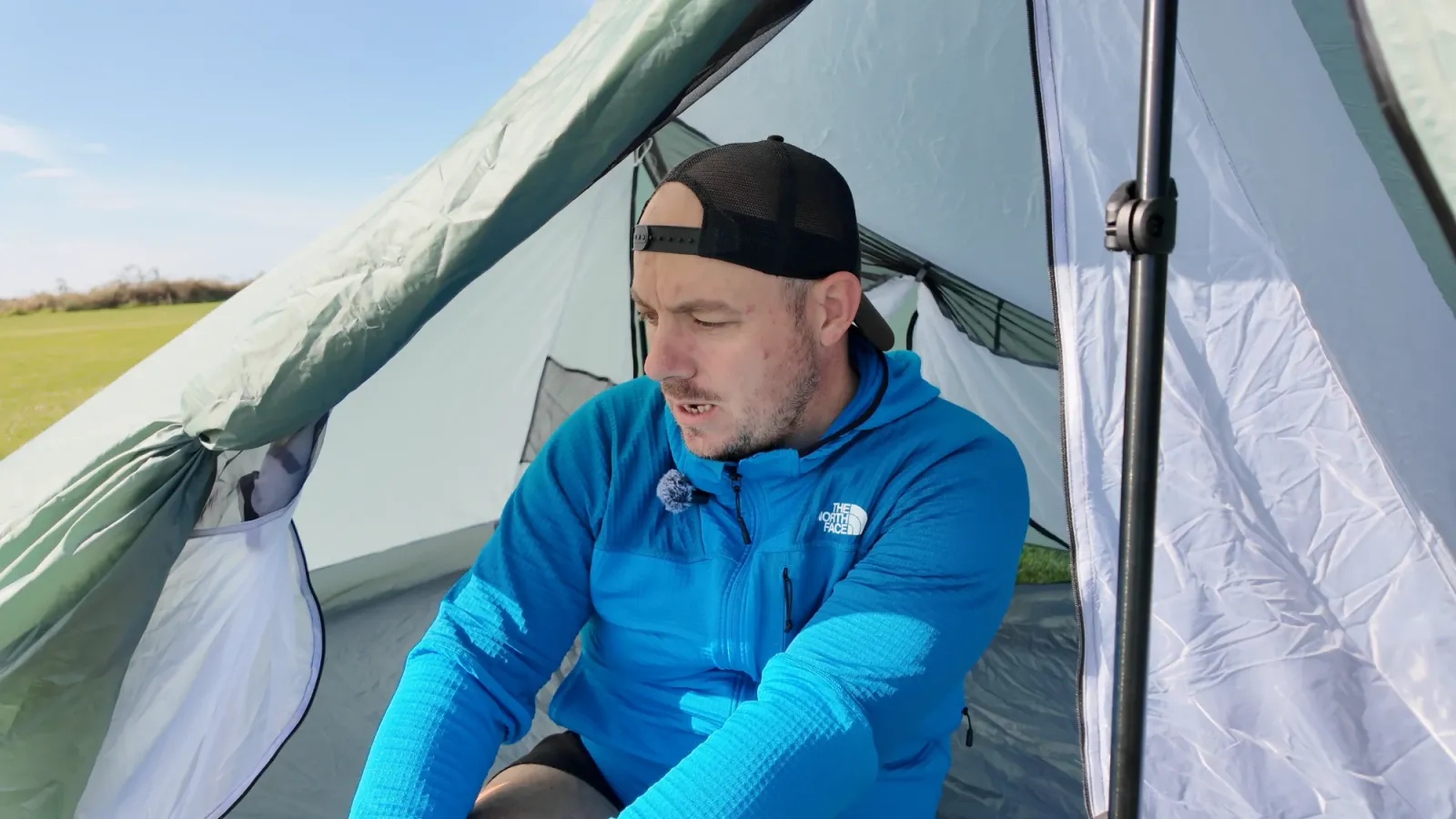 Inside the Durston X-Mid 2 — the roomy interior with both doors open and a sea view
