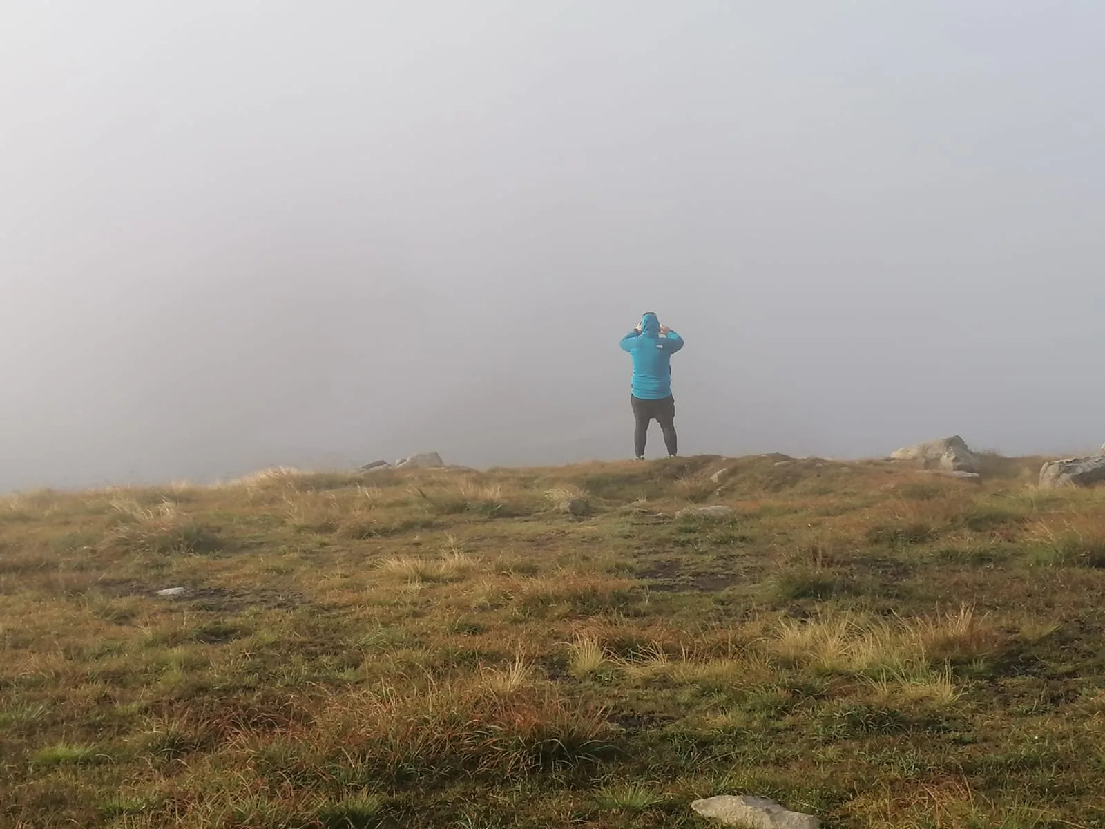 Thick clag rolling over the summit while wild camping at Lough Shannagh in the Mourne Mountains