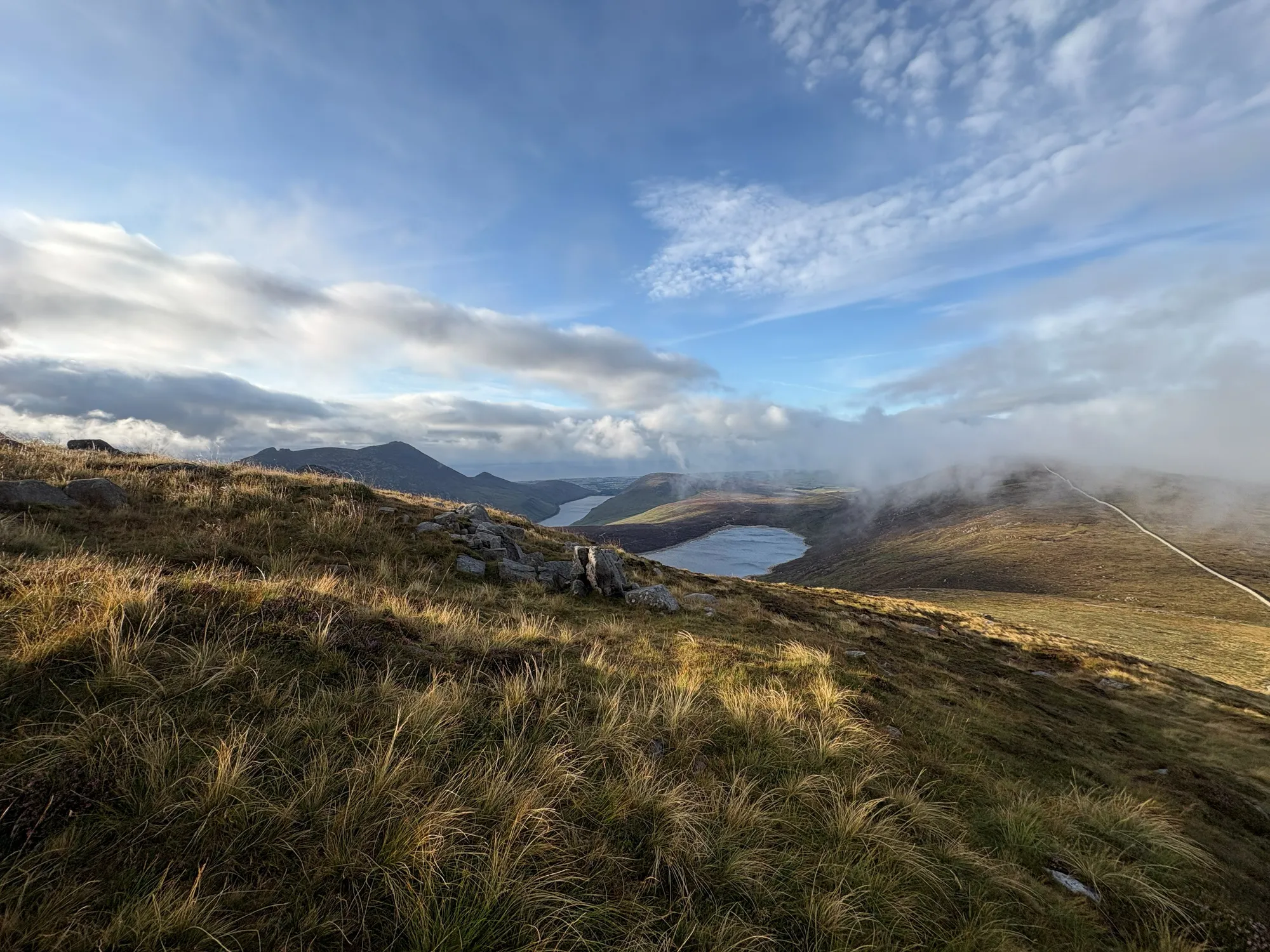 Lough Shannagh and the Mourne Mountains, the largest natural lake in the Mournes, seen from Slieve Loughshannagh